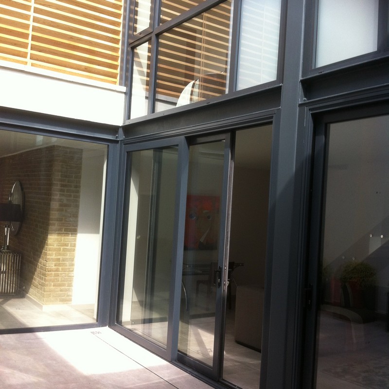 Anthracite aluminium sliding patio doors fitted in  Bromley by Bow